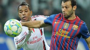 sport 28.03.12. Robinho (L) of Milan and Javier Mascherano of Barcelona in actio