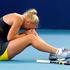 Caroline Wozniacki je na dvoboju z Ano Ivanović padla in si poškodovala koleno, 