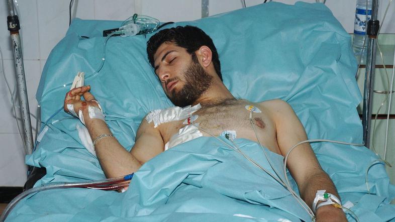 Ranjenec iz mesta Latakia. (Foto: Reuters)