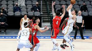 Luka Dončić in JJ Redick