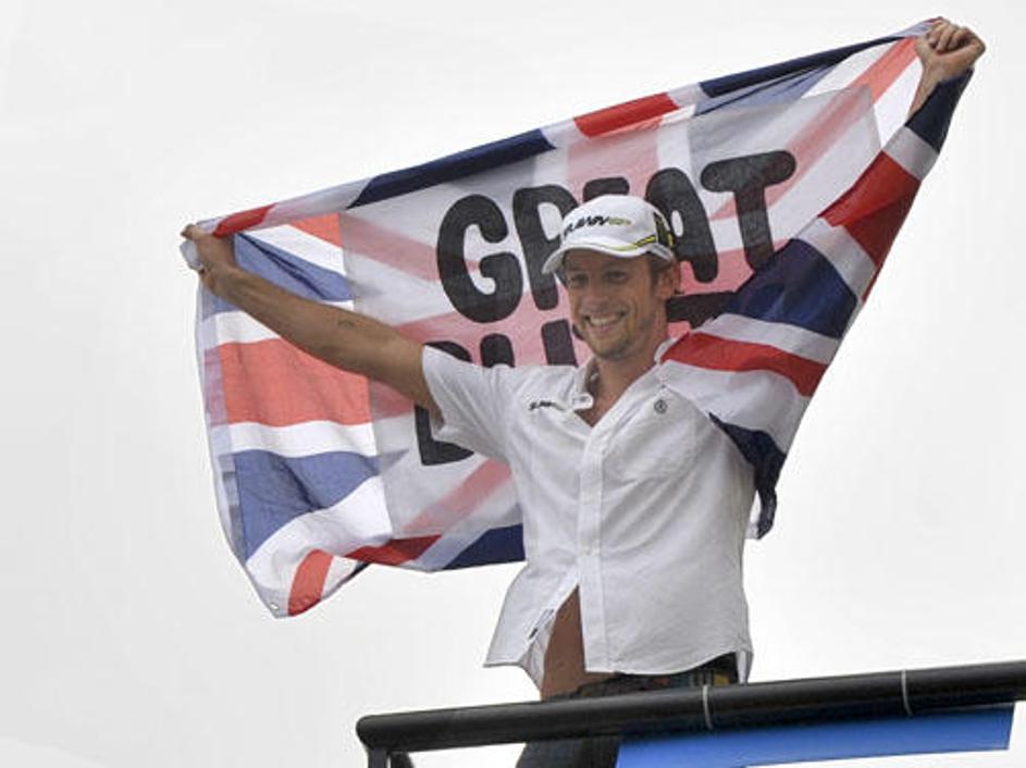 Button bo v novi sezoni formule 1 sedel v dirkalniku moštva McLaren. (Foto: Reut