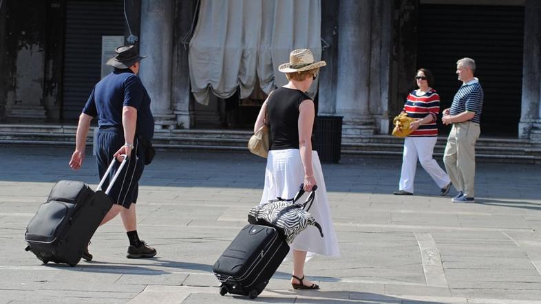 Benetke kovčki turisti