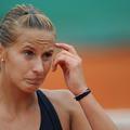 Polona se je Aljoni dobro upirala, a na koncu morala priznati premoč. (Foto: AFP