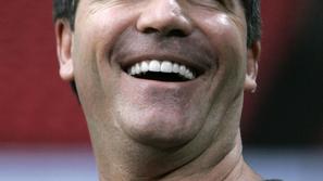 Simon COwell