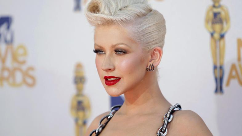 Ženske se ji zdijo privlačnejše od moških, a vseeno ljubi svojega moža. (Foto: R