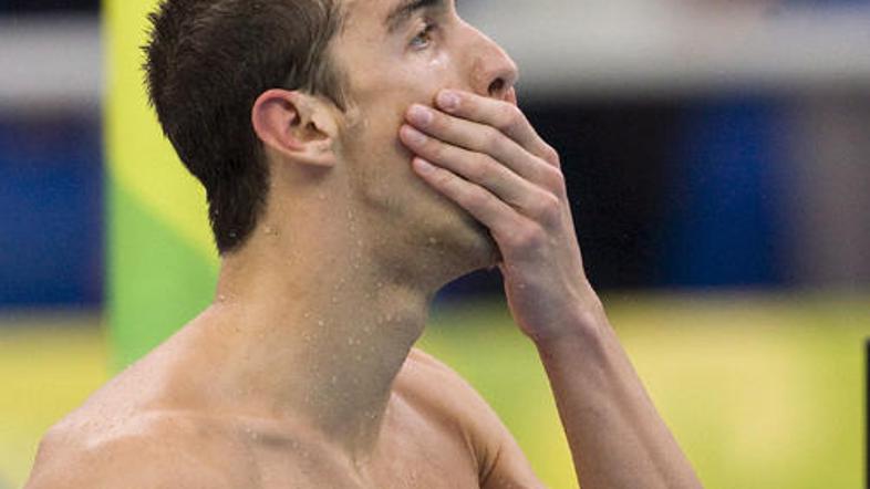 Michael Phelps je šest zlatih osvojil v Atenah, lani v Pekingu pa še osem zlatih