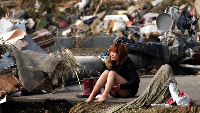 Japonce še vedno mučijo številne težave. (Foto: Reuters)