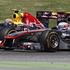 Mark Webber (Red Bull) in Jenson Button (McLaren)