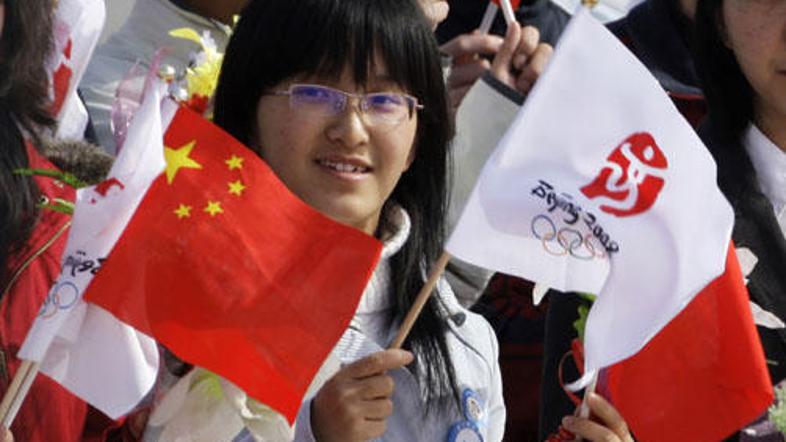 Navijači v Pekingu olimpijske igre že nestrpno pričakujejo.