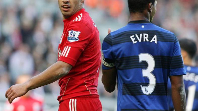 Luis Suarez naj bi z rasističnimi zmerljivkami napadel Patrica Evraja