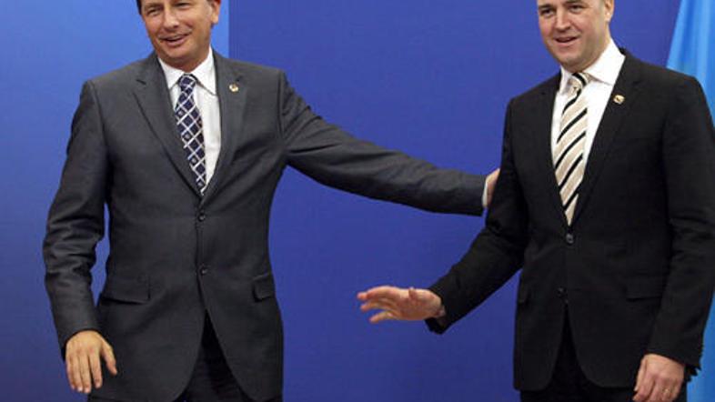 Voditelji, med njimi premier Borut Pahor, zasedajo brez ministrov. (Foto: Reuter