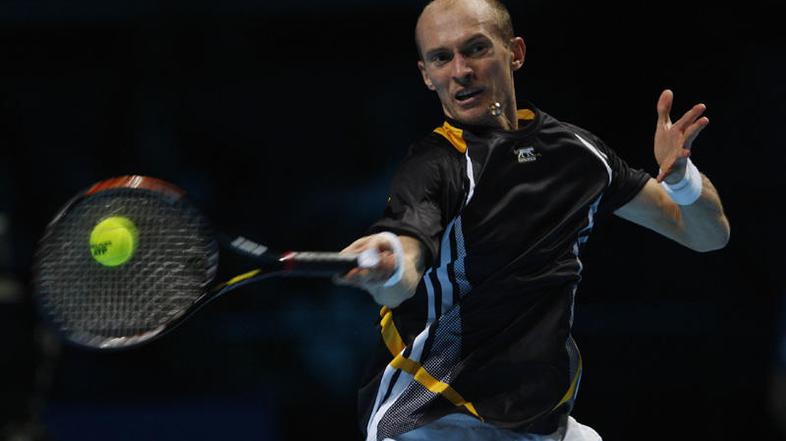 Nikolaj Davidenko je prvič v karieri premagal Rogerja Federerja. (Foto: Reuters)