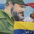 Fidel Castro, 85. rojstni dan, poziranje pred Castrovo sliko