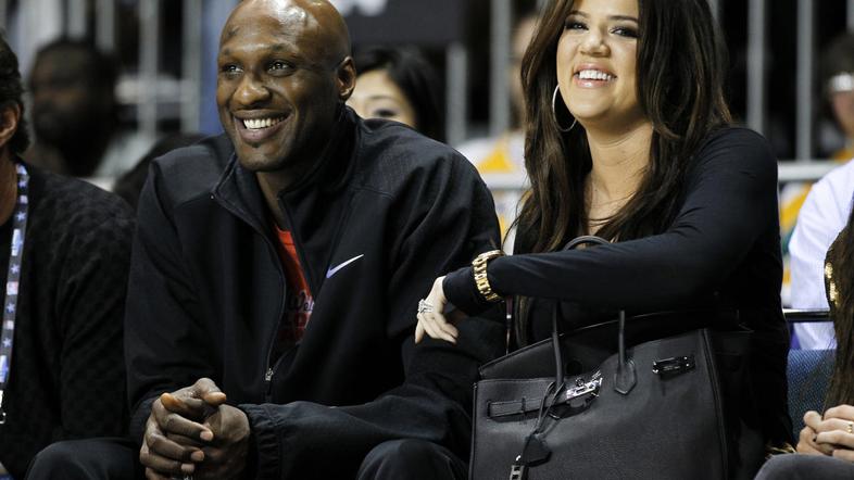 Khloe in njen mož, košarkar Lamar Odom se trudita zanositi. (Foto: Reuters)