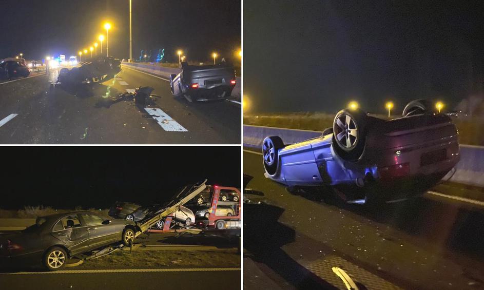 Prometna nesreča, avtomobili padli s tovornjaka