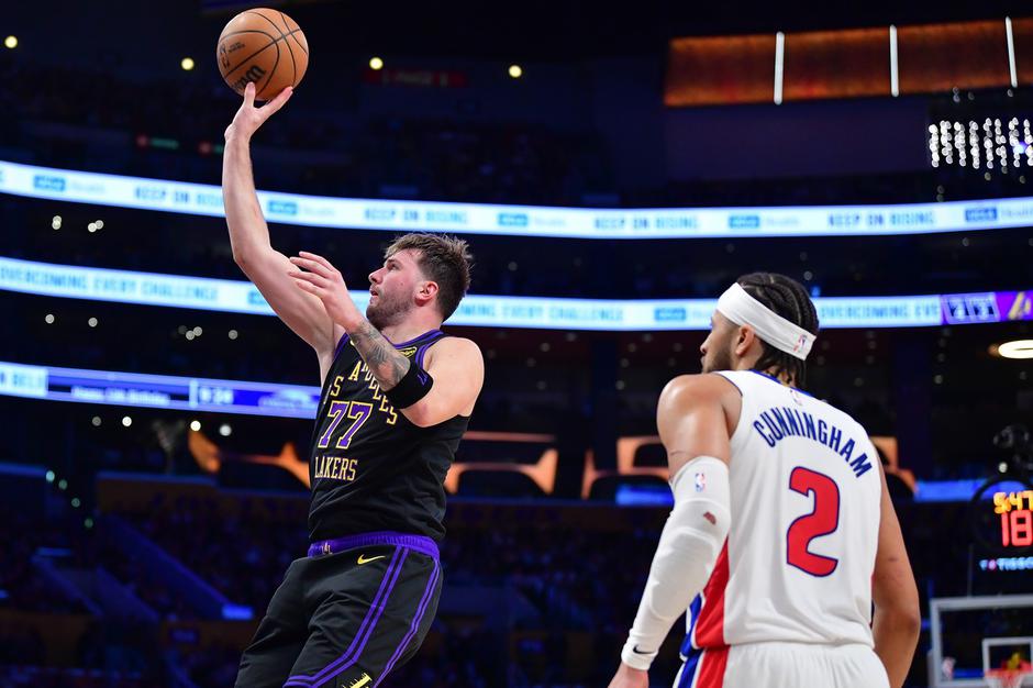 Luka Dončić in Cade Cunningham | Avtor: Profimedia