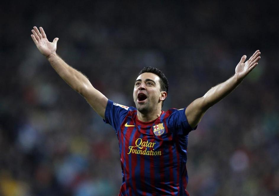 el clasico real barcelona xavi