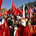 Podporniki olimpijskih iger v Pekingu so ob poti olimpijskega ognja v Canberri p