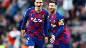 Lionel Messi in Antoine Griezmann