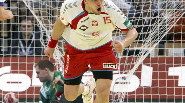 Michal Jurecki je skupaj s soigralci na EP slavil še drugič. (Foto: Reuters)