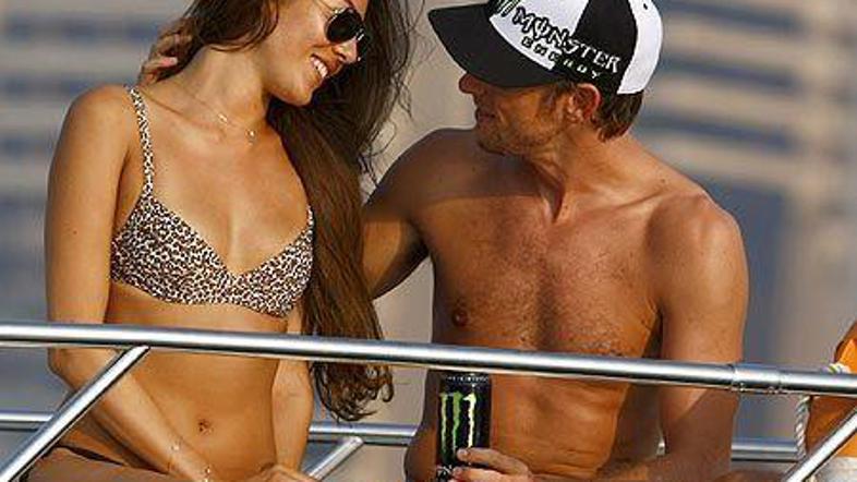 Jenson Button in Jessica Michibata.