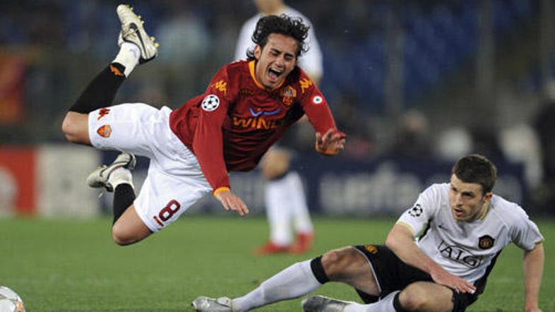 Alberto Aquilani (Roma) in Michael Carrick (Manchester United)