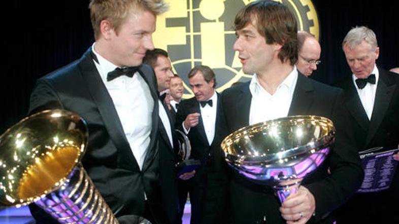 Kimi Räikkönen in Sebastian Loeb na podelitvi pokalov