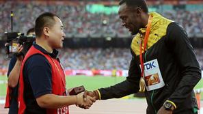 usain bolt snemalec sp atletika peking 200 metrov segway