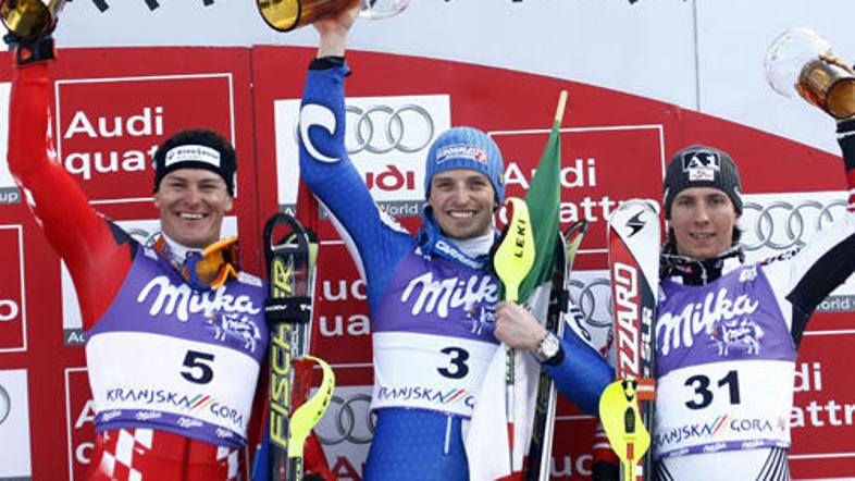 Zmagovalec Kranjske Gore Manfred Mölgg ter drugo in tretje uvrščena Ivica Kostel