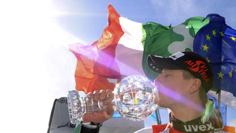 Avstrijec Hannes Reichelt je z zmago osvojil še mali kristalni globus.