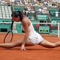 Očitno gibčna Jelena Janković je bila pri preoblačenju manj spretna - ujele so j