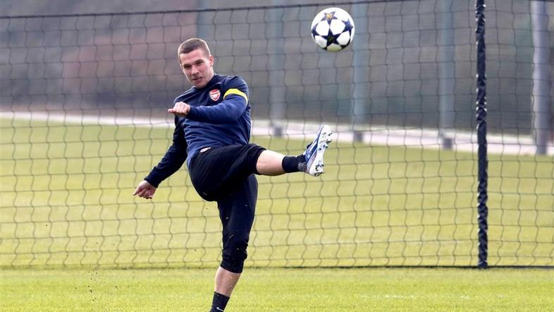 Podolski Arsenal Bayern trening Liga prvakov osmina finala