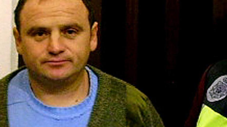 Veselin Vlahović ob aretaciji. (Foto: Reuters)