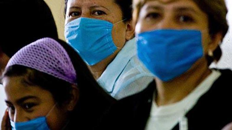 Zdravniki svarijo, naj starši ne izpostavljajo otrok novi gripi.