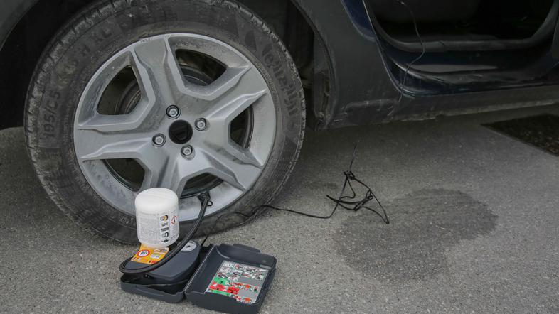 Prazna pnevmatika in kit za popravilo