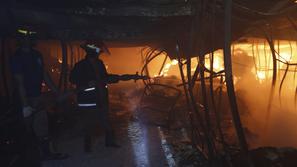 razno 09.10.13. pozar v tekstilni tovarni hm, banglades, foto: reuters