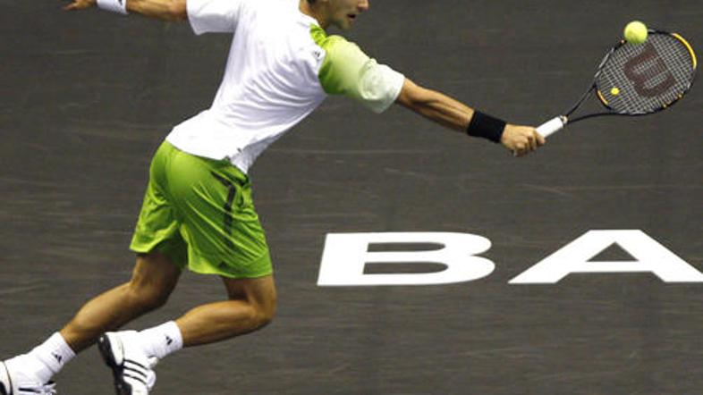 Novak Djoković si je z zmago proti Tomašu Berdychu priigral nov finale s Tsongo.