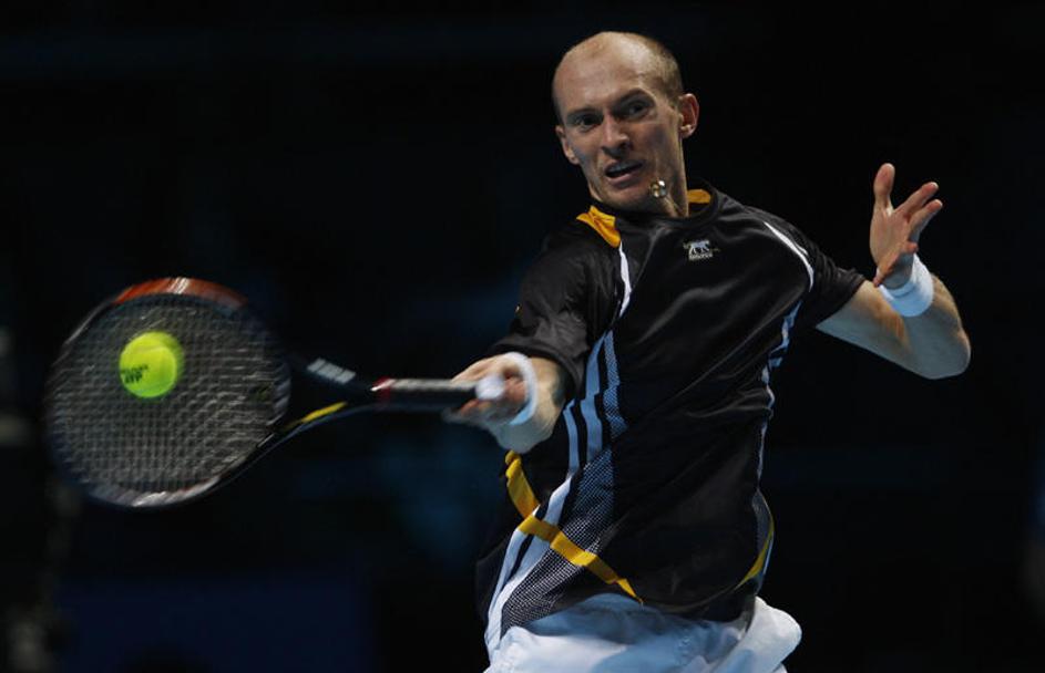 Nikolaj Davidenko je prvič v karieri premagal Rogerja Federerja. (Foto: Reuters)