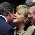 Britain's Prime Minister Cameron greets Germany's Chancellor Merkel while EC Pre