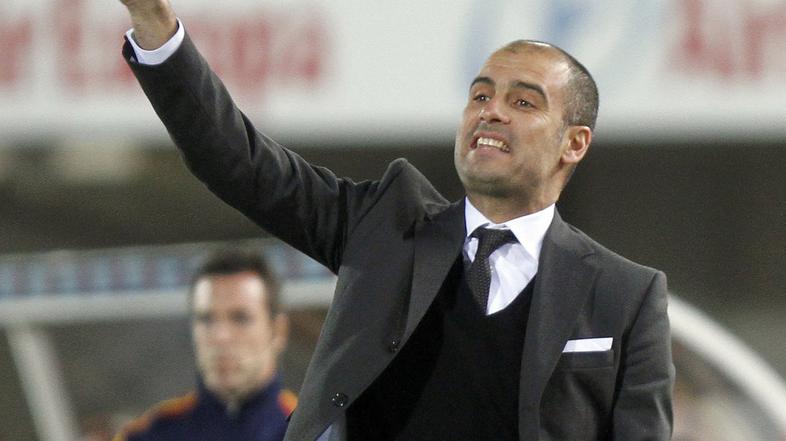 Pep Guardiola je le s težavo v sredo vodil svoje fante v Valencii. (Foto: Reuter
