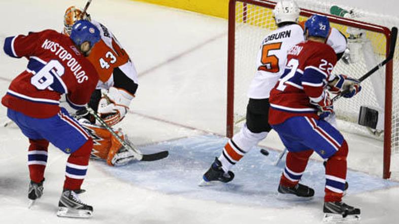 Zmagoviti zadetek Toma Kostopoulosa v prvi minuti podaljška.