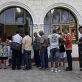 razno 14.01.13. People line up outside a passport office in Havana January 11, 2