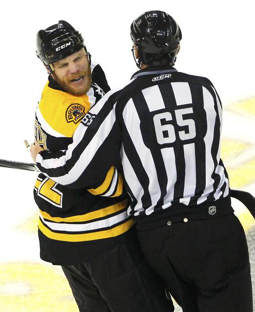 Shawn Thornton in Pierre Racicot