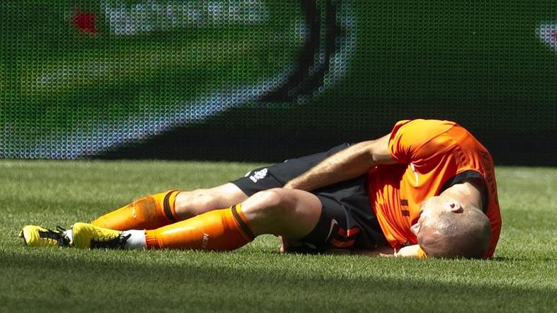 Arjen Robben se je poškodoval proti Madžarski. (Foto: EPA)