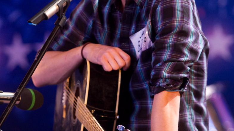 Nastopil je s svojo pesmijo. (Foto: Miro Majcen)