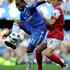 Didier Drogba in Laurent Koscielny