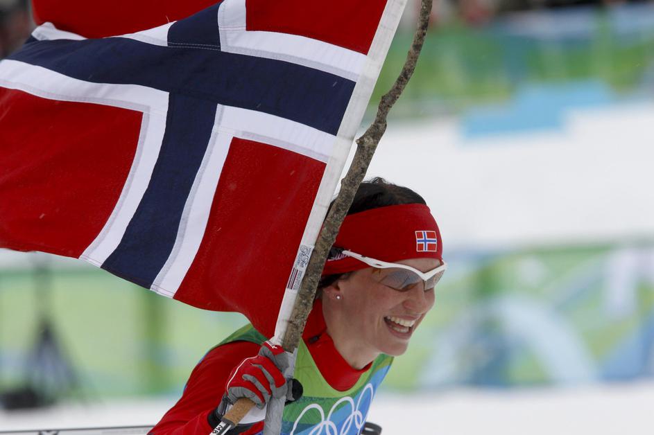 Marit Björgen je ob Pettru Northungu prva adutinja domačega SP. (Foto: Reuters)