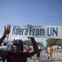 kolera, haiti, protesti, združeni narodi, neredi, ulica