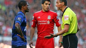 Luis Suarez naj bi z rasističnimi zmerljivkami napadel Patrica Evraja