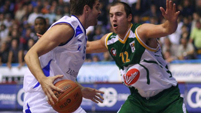 Marko Milič je dolgo časa sam Olimpijo držal v igri. Žal njegovih 19 točk ni bil